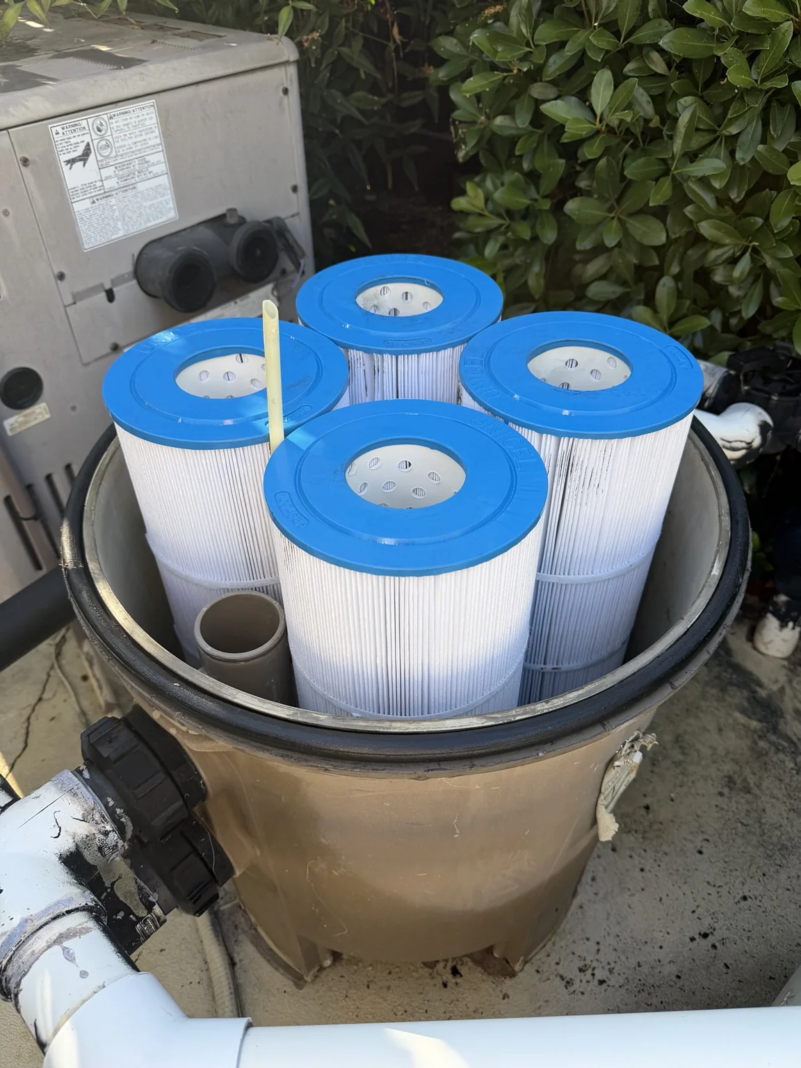 New clean pool filter cartridges installed in the filter tank